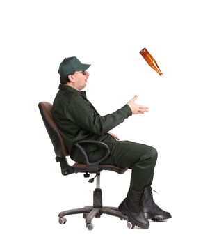 Worker catching beer bottle. Isolated on a white background.