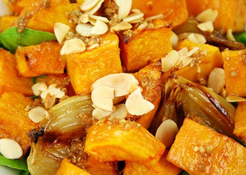 Roasted pumpkin and onion salad with wilted spinach and toasted almonds.