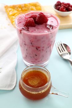 Delicious raspberry smoothie with sweet pineapple syrup.