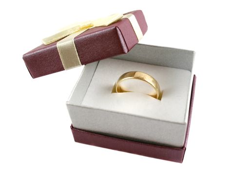 Gold wedding band set in a ring gift box.