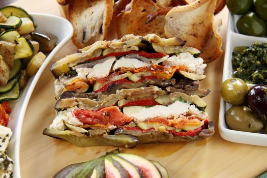 Delightful rustic vegetarian stack with assorted vegetables and toasty bread.