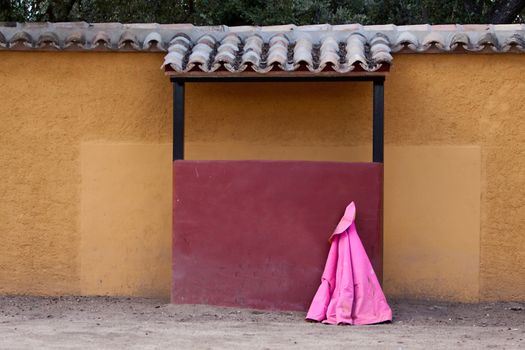 Small square of bulls or called tentadero, capote with a burladero, Jaen, Andalusia, Spain