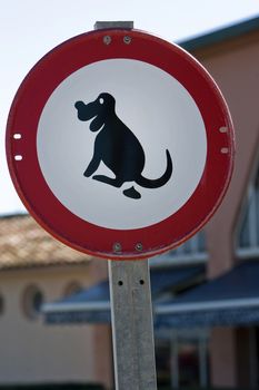 Pooping dog sign