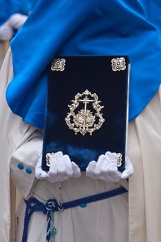 penitent with the rule book governing the brotherhood with velvet caps and appliques of embossed silver, Spain