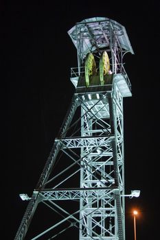 A mine shaft tower at night in Linares, Jaen province, Andalusia, Spain