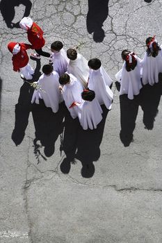 Aerial view of a penitents in a procession of holy week on Palm Sunday, Andalucia, Spain