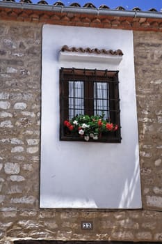 Typical Andalusian window in a traditional house of Ubeda, Jaen province, Andalucia, Spain