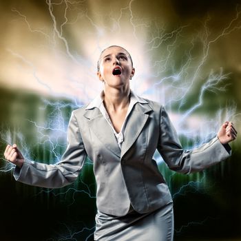 furious woman is straining arms and looking up, concept violent person