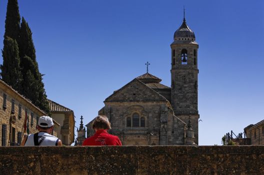 The Sacred Chapel of El Salvador (Capilla del Salvador) in the Plaza de Vazquez de Molina with the Parador hotel to the left, Ubeda, Jaen Province, Andalusia, Spain