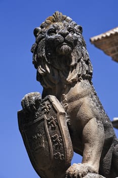 Lion statue with shield at Ubeda city, Jaen province, Andalusia, Spain