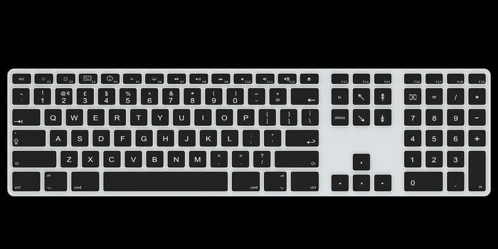 Computer keyboard isolated on dark background. Top view