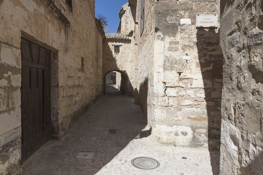 Typical Street of the world heritage city in Baeza, Street Cobertizo next to the cathedral, Jaen province, Andalucia, Spain