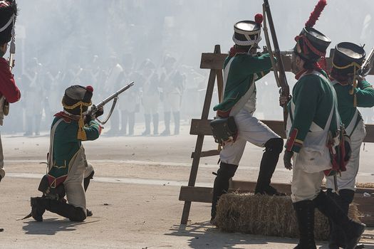 French soldiers at the barricades by firing at the enemy during Representation of the Battle of Bailen, Bailen  Jaen province, Andalusia, Spain