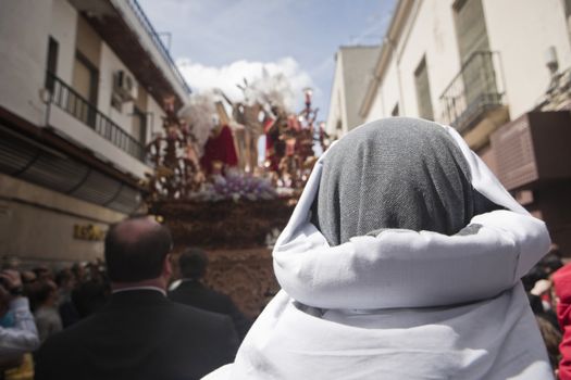 costalero during a procession of holy week, Andalucia, Spain