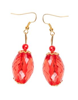 Earrings in red glass with gold elements isolated on a white background. Collage.