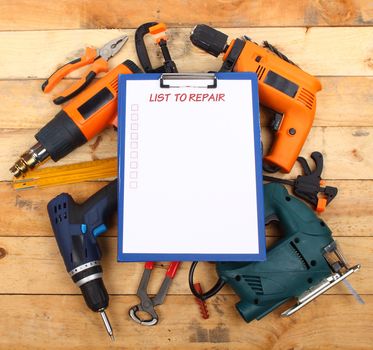  power hand tools and clipboard