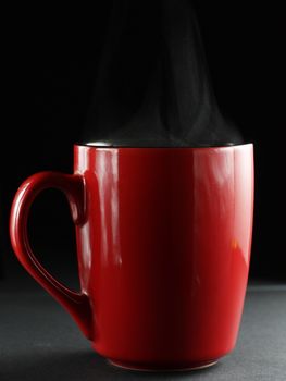 Cup of coffe on a dark background