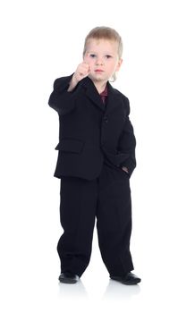 Little businessman isolated on the white shows finger