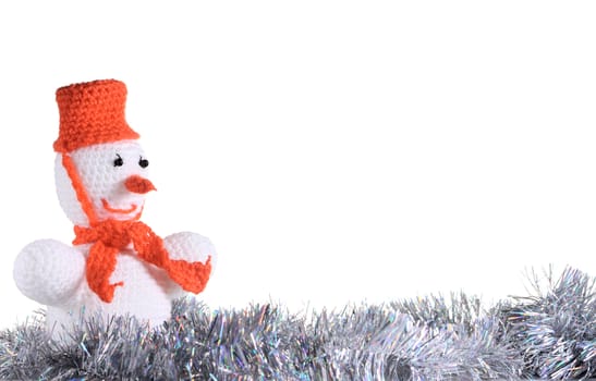 White snowman made from threads at the white background