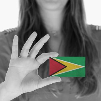 Woman showing a business card, flag of