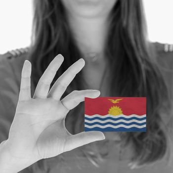 Woman showing a business card, flag of Swaziland