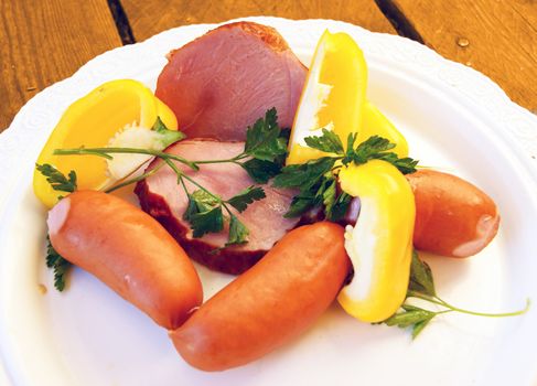 Hot dogs and salad on white background is insulated