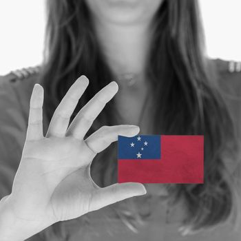 Woman showing a business card, flag of Samoa