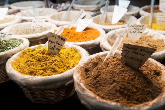 Market with a variation of spices in a basket