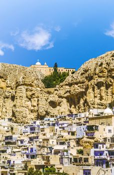 Ma'loula or Maaloula, a small Christian village in the Rif Dimashq Governorate in Syria.