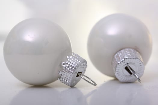 white christmas balls with white background 