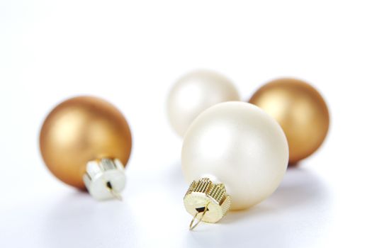 Christmas balls white and brown on white background 