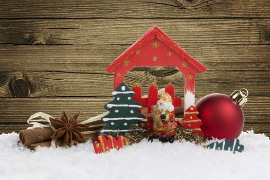 Christmas decoration with presents on wood board 