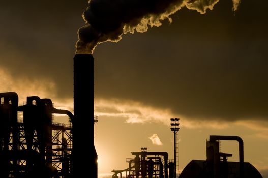 Silhouette of an industrial plant. Image with strong impact to represent industry and/or pollution