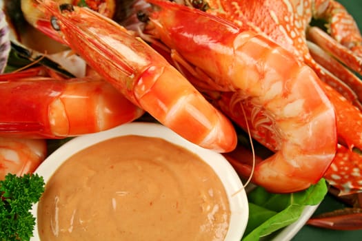 Fresh seafood platter of cooked shrimps, sand crab with coriander with Thousand Island Dressing.