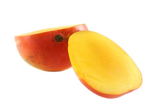 Fresh mango sliced in half ready to eat.