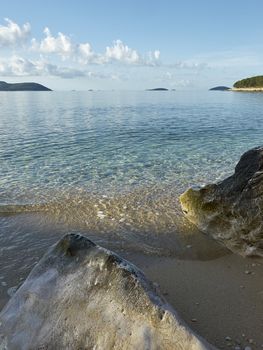 Beach in morning light at island og Prvic      