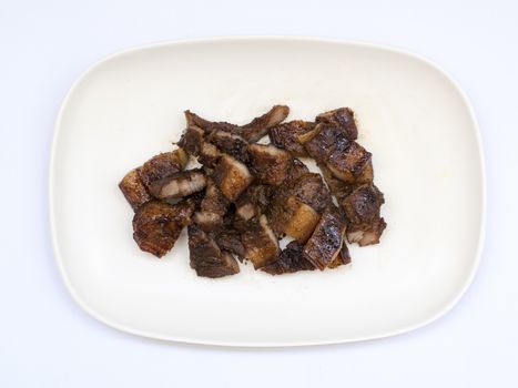 grilled barbecued pork on a plate