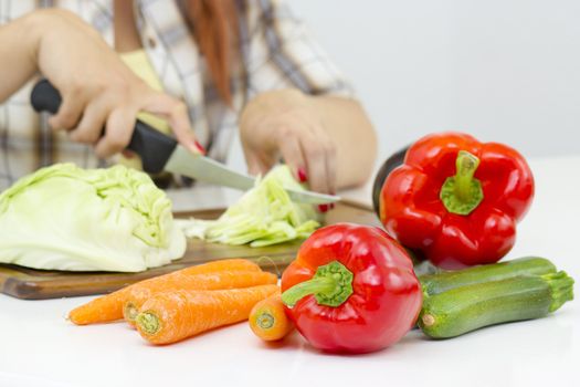 woman cutting vegetables