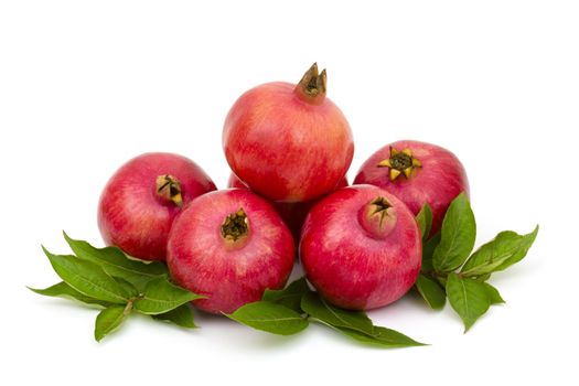 fresh pomegranates on white background