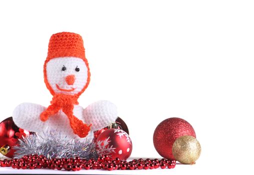 White snowman with christmas toys  made from threads at the white background