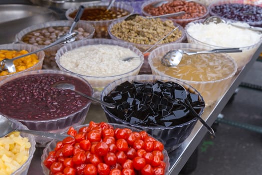 Toppings for Taiwanese shaved ice dessert at a vendor