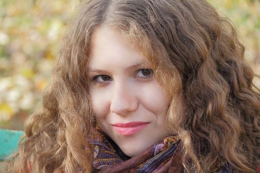 Portrait of thinking young woman with long hair