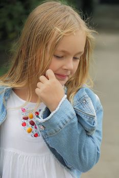 Portrait of beautiful girl with blue eyes