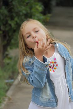 Portrait of girl with smile and makes faces