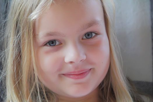 Portrait of beautiful girl with blue eyes