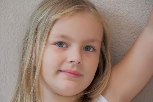 Portrait of beautiful girl with blue eyes