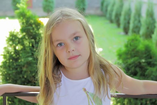 Portrait of beautiful girl with blue eyes