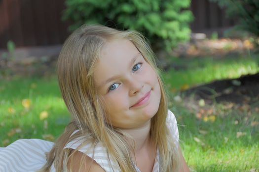 Portrait of beautiful girl with blue eyes