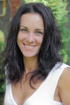 Portrait of young woman with black nature hair