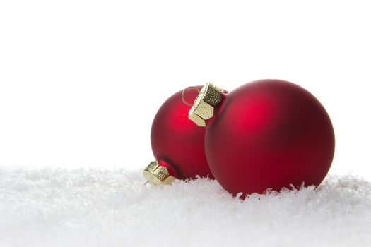 christmas, red christmas balls on snow  